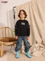 Boys Summer Cotton Paris Graphic Crewneck in Lime Black and Cream with bubbly text and sleeve patch