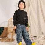 Boys Summer Cotton Lift Pocket Crewneck in Camel Cream and Black with utility pocket and back print