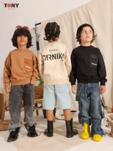 Boys Summer Cotton Lift Pocket Crewneck in Camel Cream and Black with utility pocket and back print